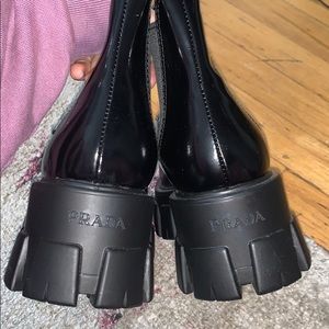 Black Prada lug sole boots